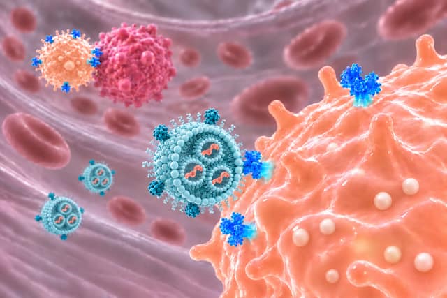 Illustration of targeted lipid nanoparticles delivering mRNA to NK cells near a tumour cell